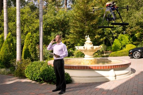 Ed Kaminsky of Premiere Estates Auction Company with his marketing drone.